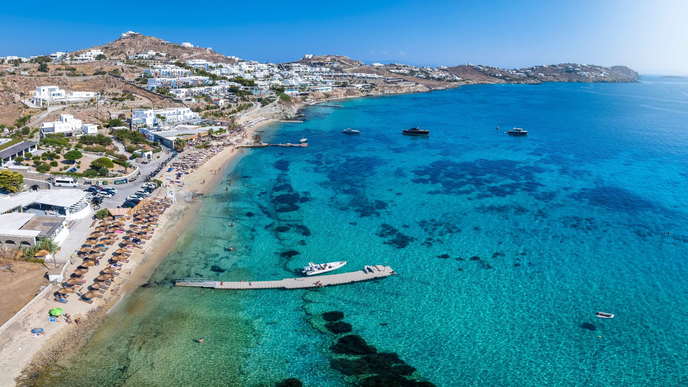 The beautiful beach of Agios Ioannis on the island of Mykonos, Cyclades, Greece, during summer time